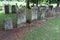 Neat rows of large headstones honoring residents, Oakwood Cemetery, Chittenango, New York, 2018