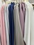 Neat rows of t-shirts with hangers