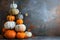 Neat stack of small pumpkins displaying different shapes and sizes. Concept Fall Decor, Pumpkins,