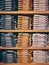 Neat Stacks Of Folded Clothing On The Shop Shelves