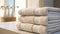 neatly folded fluffy towels in a closet within a lavish sports shower or spa pool, a minimalist modern composition that