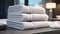 neatly folded fluffy towels in a closet within a lavish sports shower or spa pool, a minimalist modern composition that