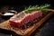 neatly placed seared tuna with a stalk of rosemary