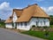 Nebel, Amrum, Germany - May 28th, 2016 - Traditional Frisian thatched cottage in the village of Nebel on the island of Amrum