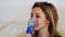 Nebulizer aerosol woman portrait holding inhaler machine