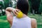 neck massage with spiky yellow massage ball for muscle pain relieve and myofascial release