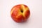 Nectarine on white background