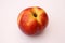 Nectarine on white background