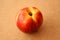 Nectarine on wooden background