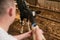 He needs his milk. Cropped shot of an unrecognizable young man feeding a calf in a dairy farm.