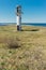 Neeme lighthouse abandoned building at coast of Baltic sea