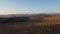 Negev desert landscape at sunrise on the bottom of the crater Makhtesh Gadol, in the south of Israel