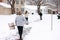 Neighbors Shoveling Heavy Snowfall