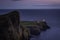 Neist Point, famous landmark with lighthouse on Isle of Skye, Scotland at blue hour