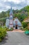 NELSON, NEW ZEALAND, FEBRUARY 5, 2020: Historial church and windmill at Founders Heritage Park at Nelson, New Zealand