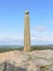 Nelsons tall weathered monument stands on the top of Birchen Edge