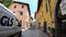 Nembro, Bergamo, Italy. Time lapse driving through the streets of the city. Driving shot, vehicle point of view. Camera on car roo