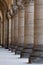 Neo-classical colonnade with old rough stone corinthian columns