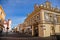 Neo-Renaissance building of the former pharmacy with sgraffito mural decorated plaster in Kladno in sunny day, Narrow picturesque