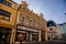 Neo-Renaissance building of the former pharmacy with sgraffito mural decorated plaster in Kladno in sunny day, Narrow picturesque