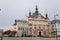 Neo-renaissance house of Ceska sporitelna and Fountain with golden Marian statue, baroque historical buildings, Square of Bohemian