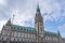 Neo-renaissance Rathaus clock tower facade at Rathausmarkt in Hamburg city hall