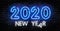 Neon 2020 new year signs  isolated on brick wall. New year party light symbol, text decoration effect. Neon 2020