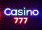 Neon 777 Casino slots sign. Casino neon signboard. Online casino concept
