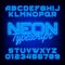 Neon alphabet font. Blue neon light letters and numbers. Dark brick wall background.