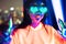 Neon  asian woman dancing. Fashion model woman in neon light, portrait of beautiful model with fluorescent make-up, Art and future