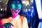 Neon  asian woman dancing. Fashion model woman in neon light, portrait of beautiful model with fluorescent make-up, Art and future