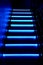 Neon background. Dark blue stairs. Night club, bar, quest, concert