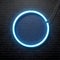 Neon blue circle isolated on black brick wall