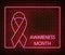 Neon breast cancer awareness signs   on brick wall. Pink ribbon light symbol, led effect. Neon illustration