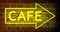 Neon cafe sign above restaurant shows diner with food available - 4k