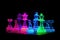 neon chess set against black background for dramatic effect