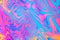 Neon colored psychodelic fluorescent striped zebra textured background