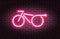 Neon electric bike, brick wall