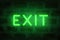 Neon exit. Vector letters on the illuminated brick wall