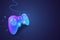 Neon game controller for controlling PC and console games. Game background concept