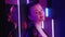 Neon girl portrait disco lights woman purple glow