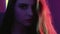 Neon girl portrait tender woman face purple glow