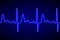 Neon heart beat ecg or ekg seamless black line on blue background