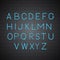 Neon light blue vector alphabet on brick wall background. Sans serif font. Glowing latin uppercase letters. Typeface for headlines