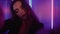 Neon light face woman video selfie flirting purple