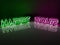 Neon light inscription happy hour in green and purple