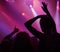 Neon, light and people dancing at concert or music festival, energy in silhouette at live show event. Dance, fun and