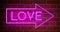 Neon love sign above entrance is advertising for nightclub or massage - 4k