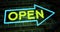 Neon open sign glowing and illuminated at a store entrance - 4k