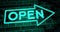 Neon open sign glowing and illuminated at a store entrance - 4k